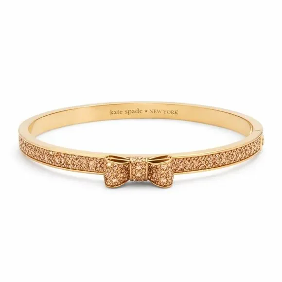 Kate Spade New York Gold Tone Glitter Bow Bangle Bracelet Round Hinged Cuff - Picture 2 of 11
